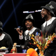 Xavier Woods (center) with fellow members of The New Day as they give thanks on Smackdown last night. They don’t usually dress as pilgrims, but they did, because... wrestling.
